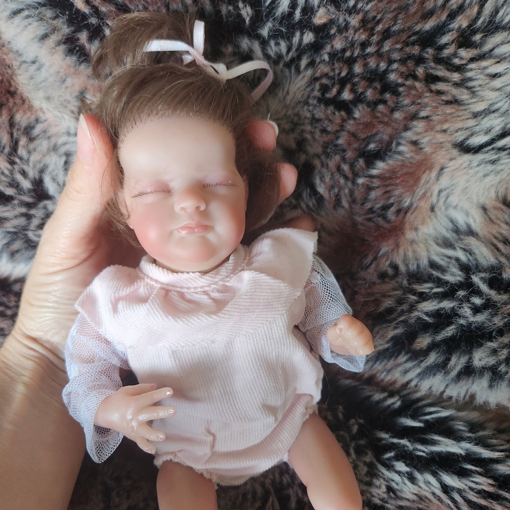 COPY - Realistic reborn baby doll dressed in pink